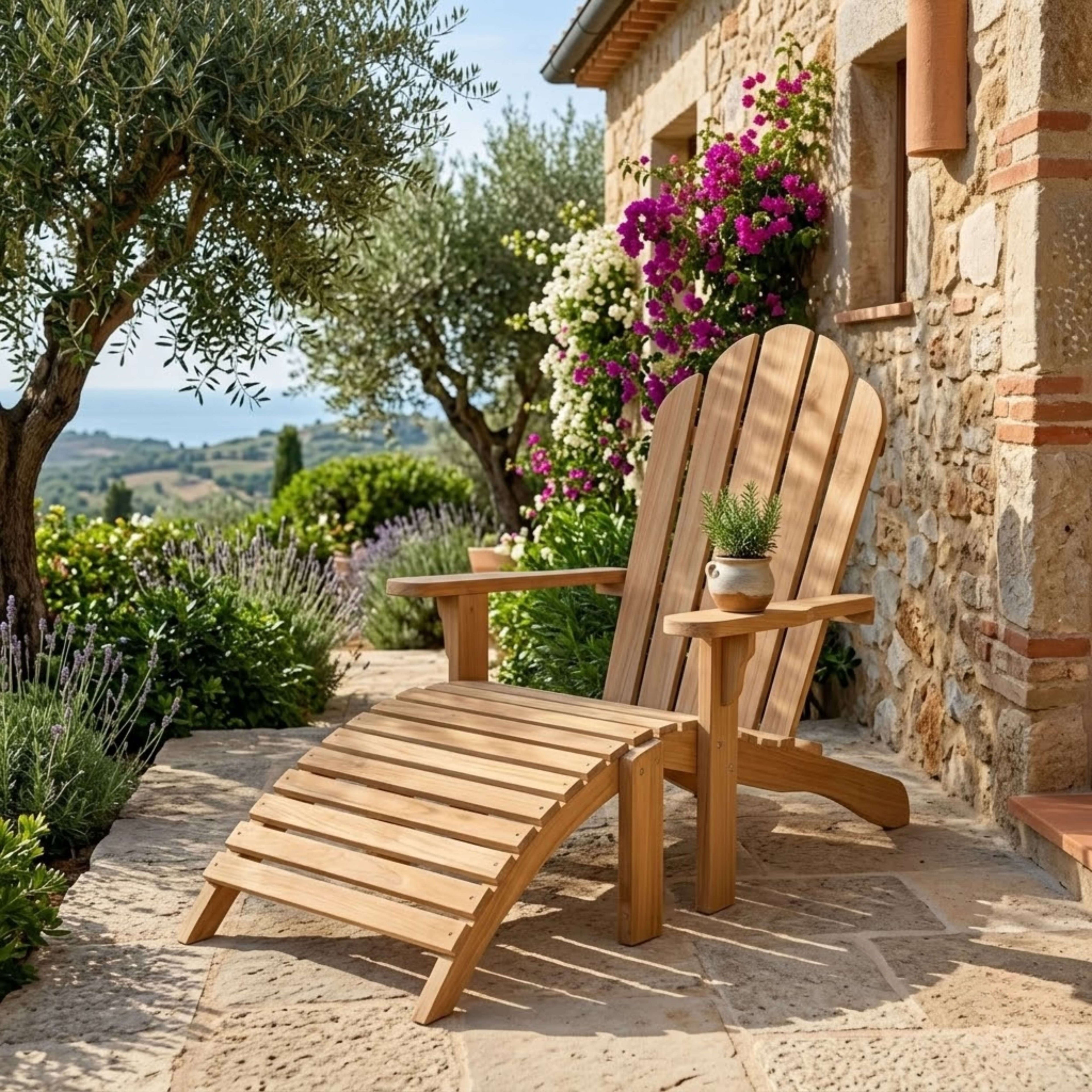 Teak Adirondack chair with matching ottoman on a stone patio