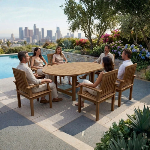 Bahama Brianna 7-Piece Extension Dining Set with oval teak table and six armchairs, poolside overlooking a city skyline