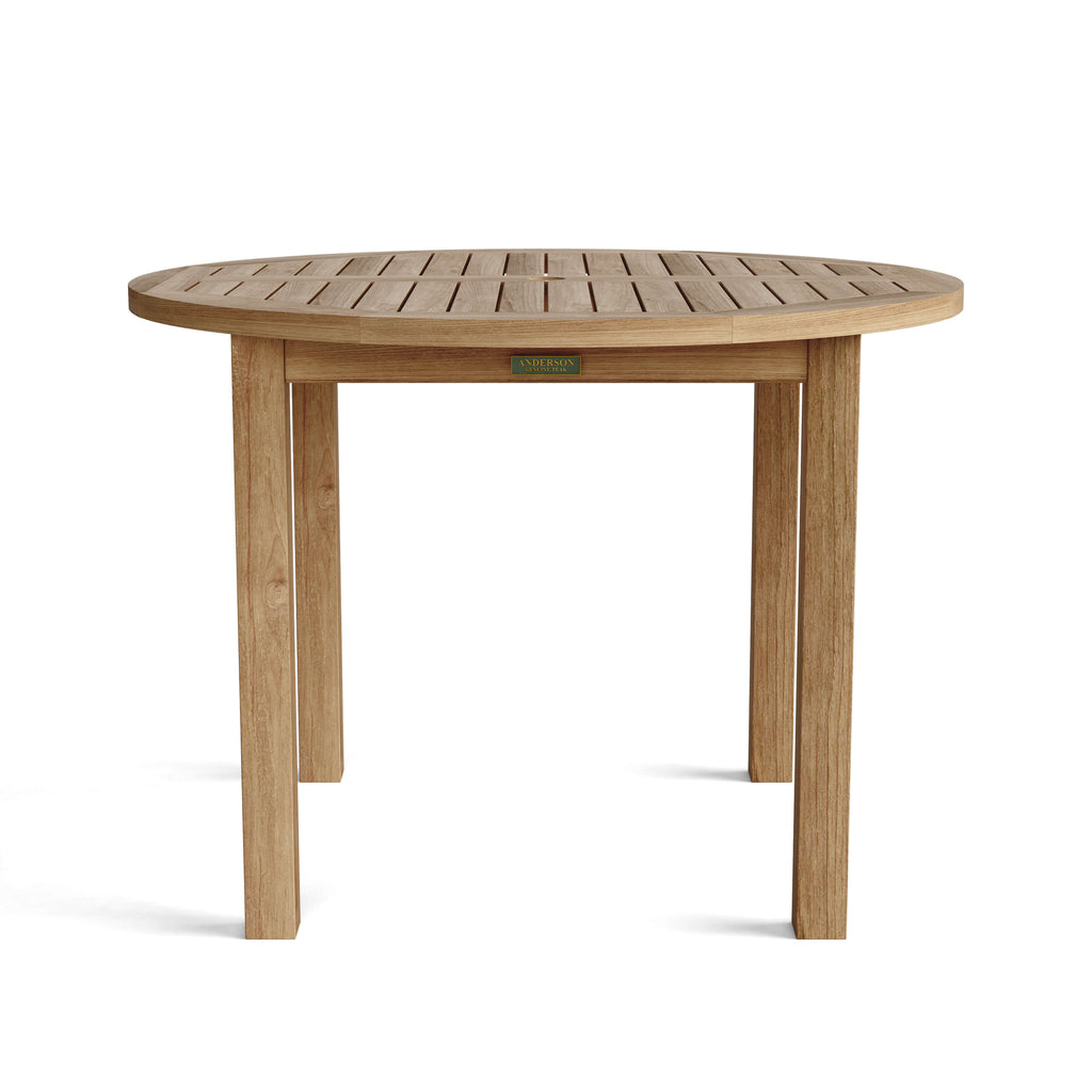 Bahama 42-inch round teak dining table shown from the front on white