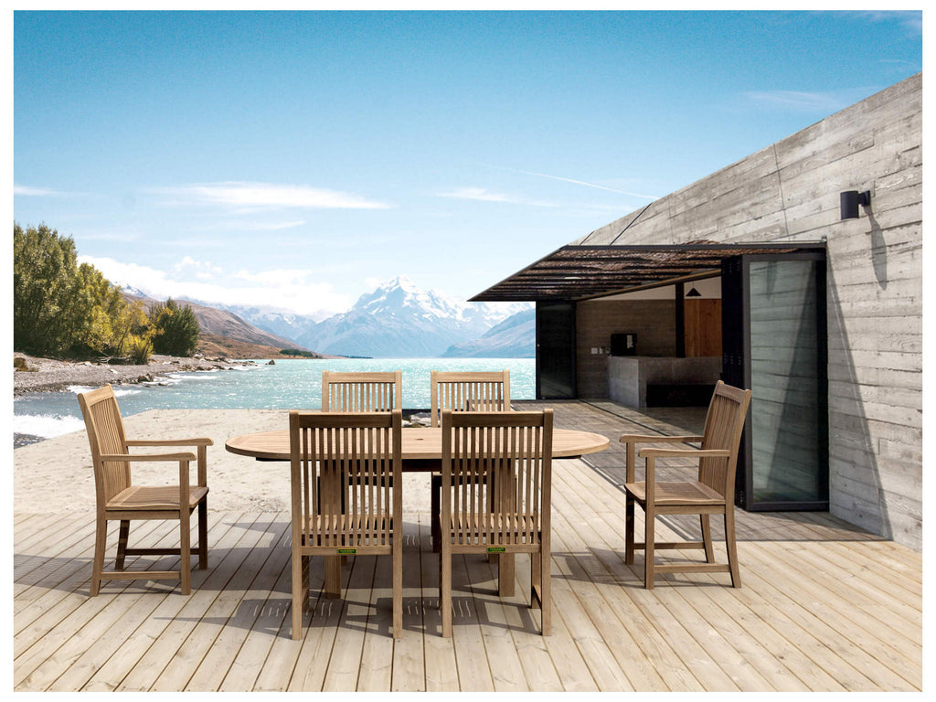 Anderson Teak Bahama Chicago 7-Piece Dining Set — teak oval extension table with two Chicago armchairs and four armless side chairs, lakeside deck
