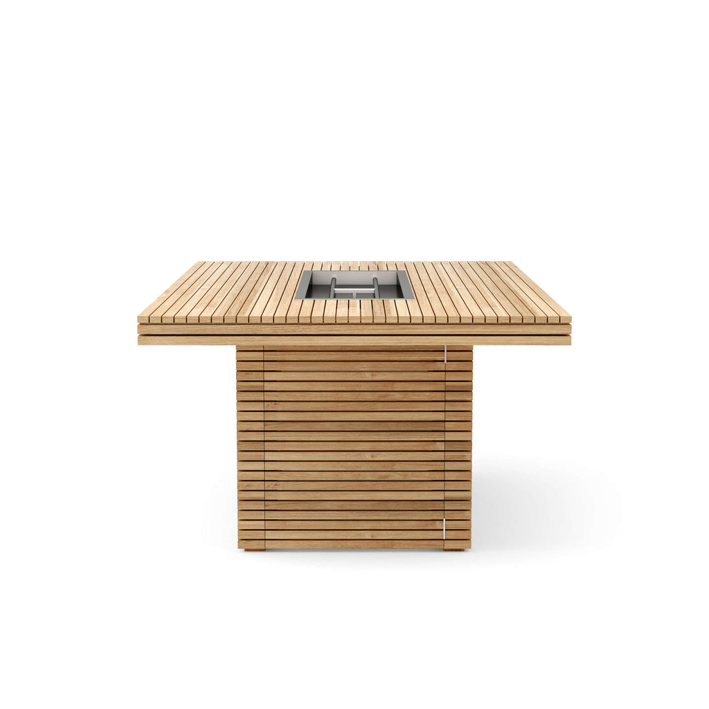 Short-end view of the Louvre teak fire table, showing the slatted base and hinged access panel.