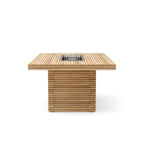 Short-end view of the Louvre teak fire table, showing the slatted base and hinged access panel.