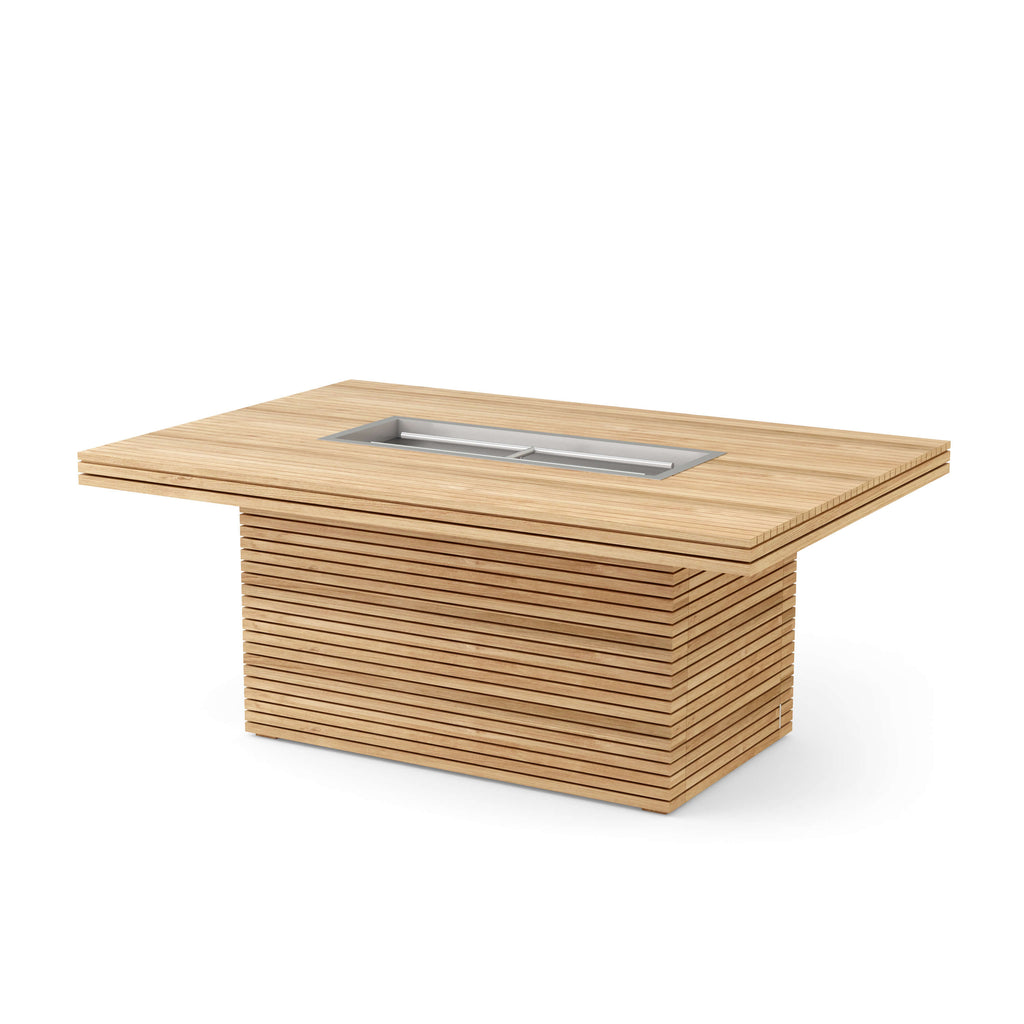 Three-quarter view of the Louvre teak fire table with its rectangular stainless-steel burner and slatted base.