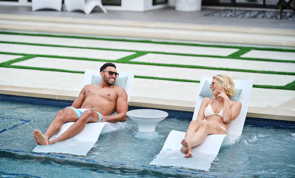 Ledge Lounger Autograph Chaise lifestyle, White, couple lounging poolside