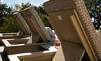 Rear detail of Ledge Lounger Echo chaise backrests, showing woodgrain-look frames, support positions and patterned cushions.