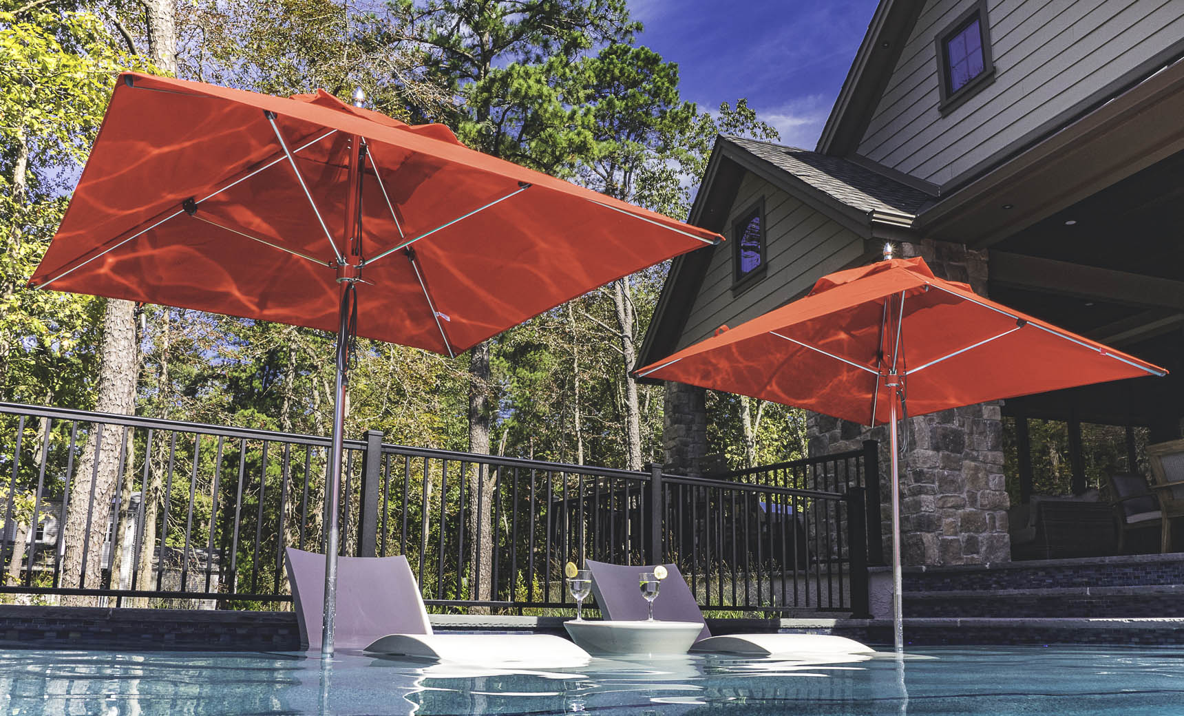 Ledge Lounger 9 foot Octagon Premier Umbrella lifestyle, poolside shade setting