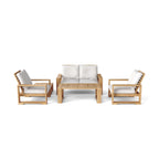 Front view of a teak loveseat conversation set for four with light cushions and a coffee table.
