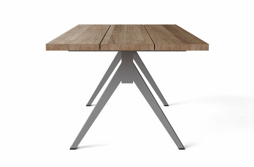 Side view of Alura teak outdoor dining table with dark gray aluminum frame — Anderson Teak TB-7939DT