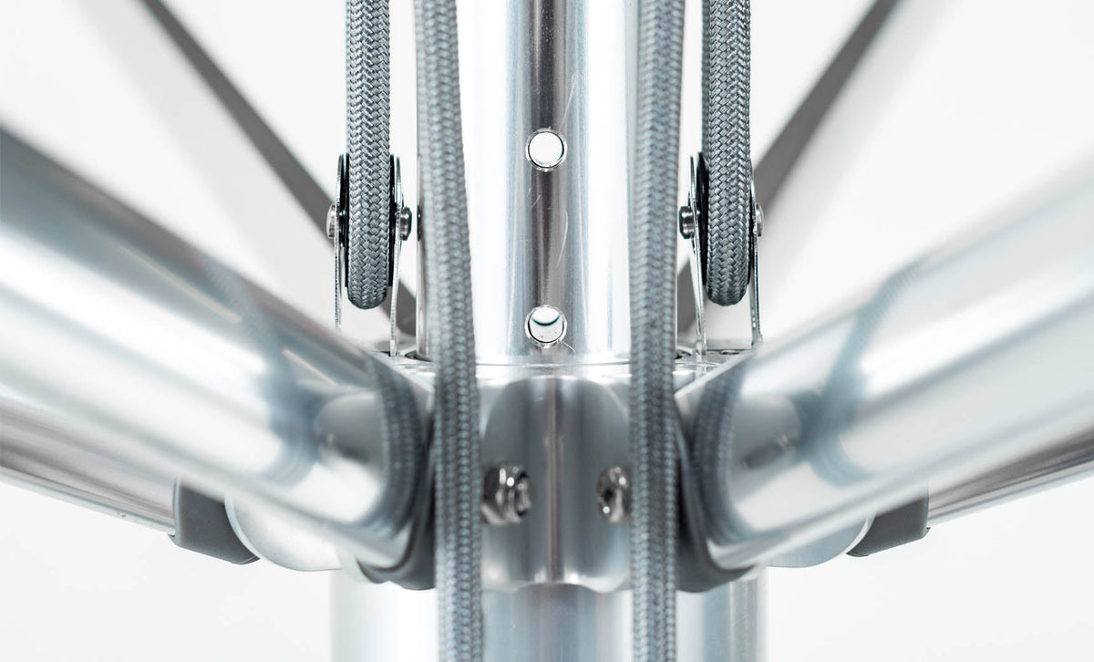 Close-up of the Premier Umbrella pulley ropes, aluminum hub and support ribs