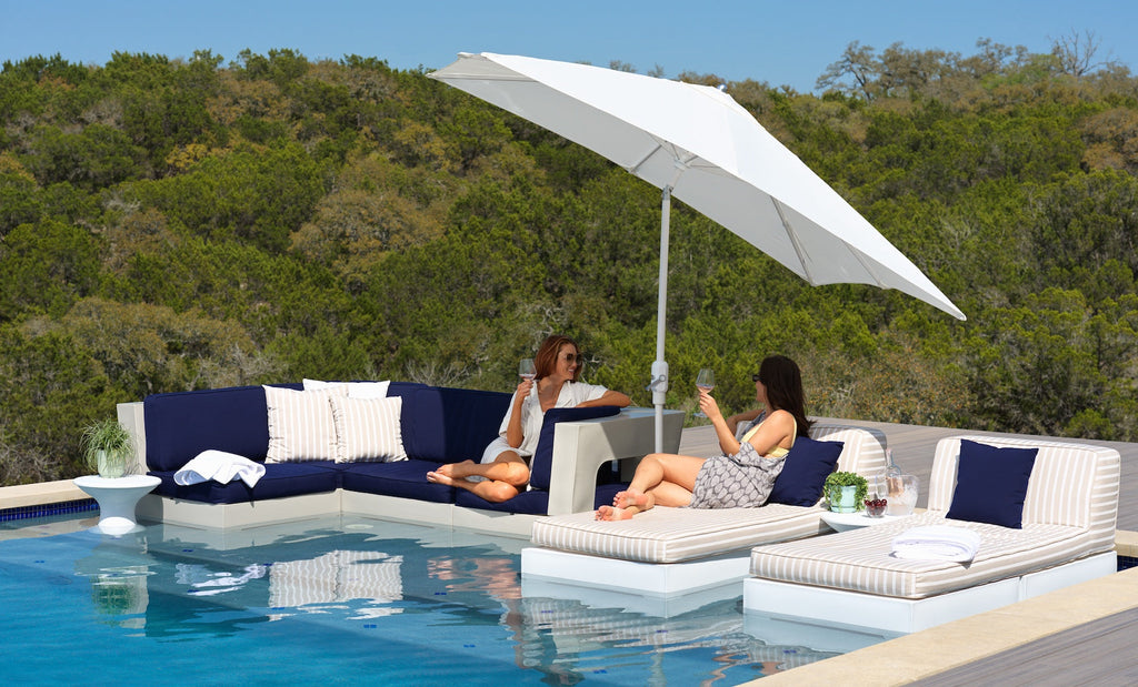 Autograph Standard Side Tables alongside an outdoor seating arrangement; seating and umbrella sold separately