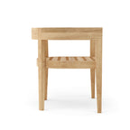 Rear view of a Coronado teak dining armchair showing the wooden frame without cushions.