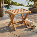 Katana FS-120 teak footstool on a poolside terrace; decorative accessories not included