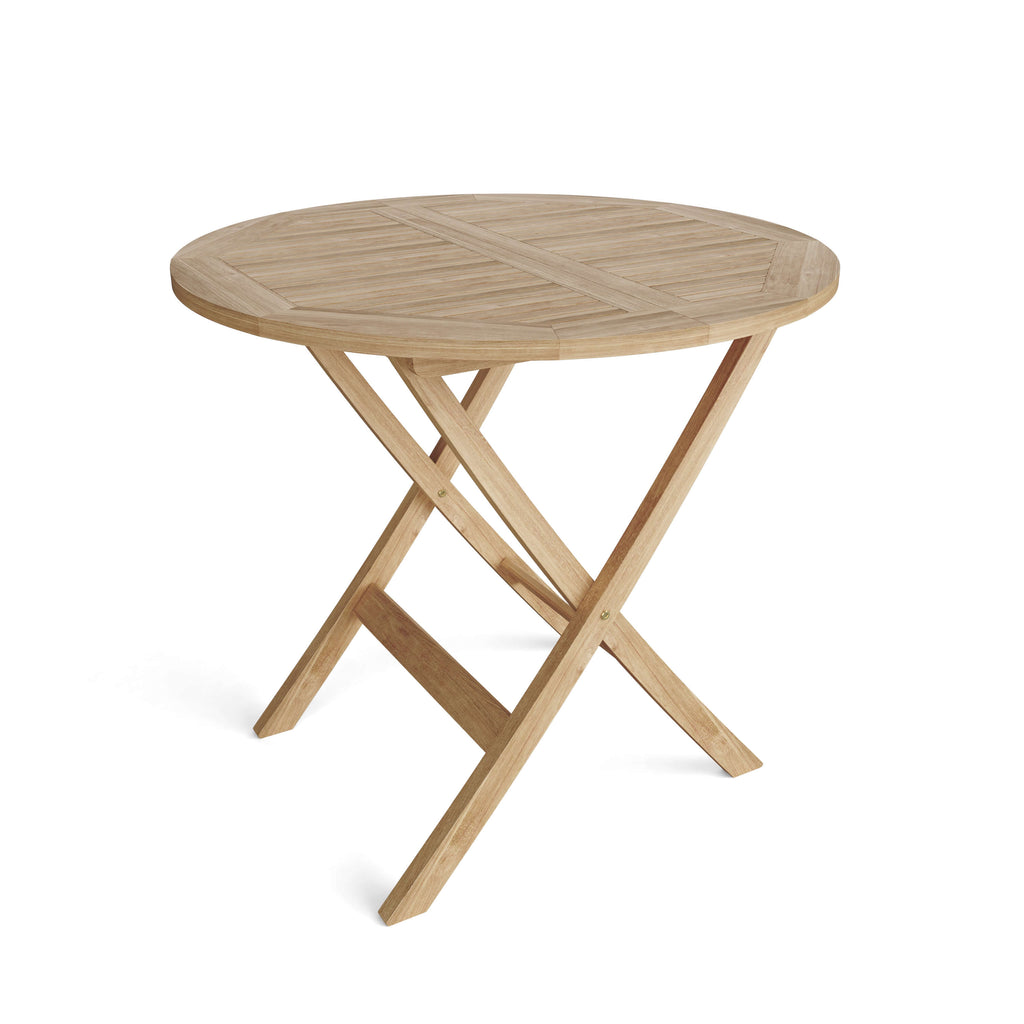 Windsor 31-inch round folding teak table, angled view