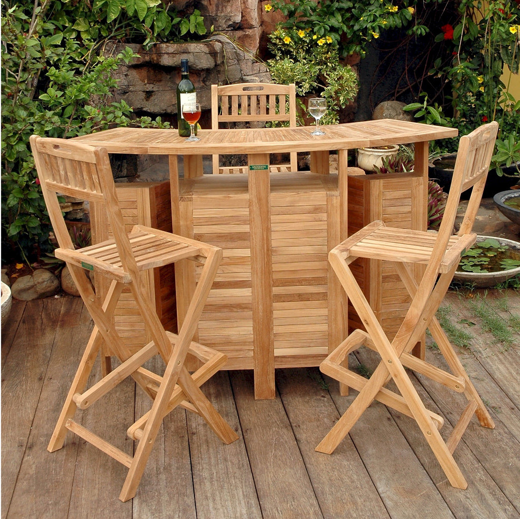 Altavista folding teak bar and chairs in a tropical garden setting