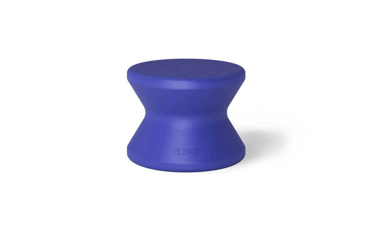 Dark blue solid-top in-pool side table with a curved pedestal and no umbrella hole.