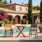 Windsor round folding teak bistro set for two beside a villa pool